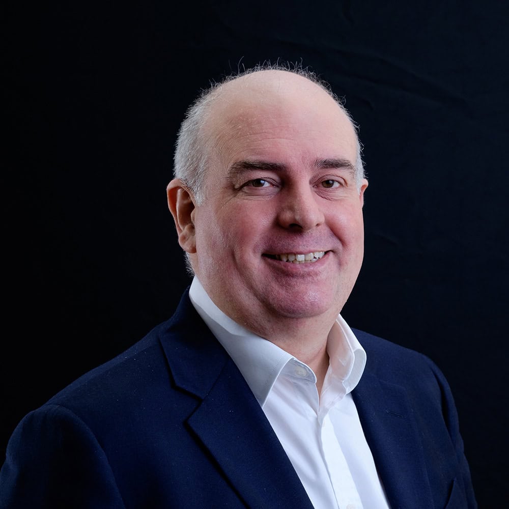 Headshot of Andrew Coulson